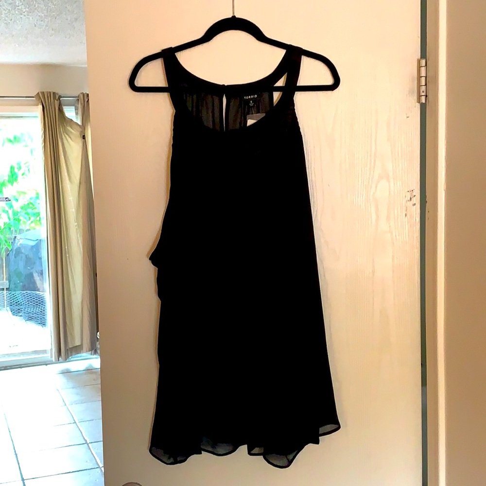 Black sleeveless blouse
